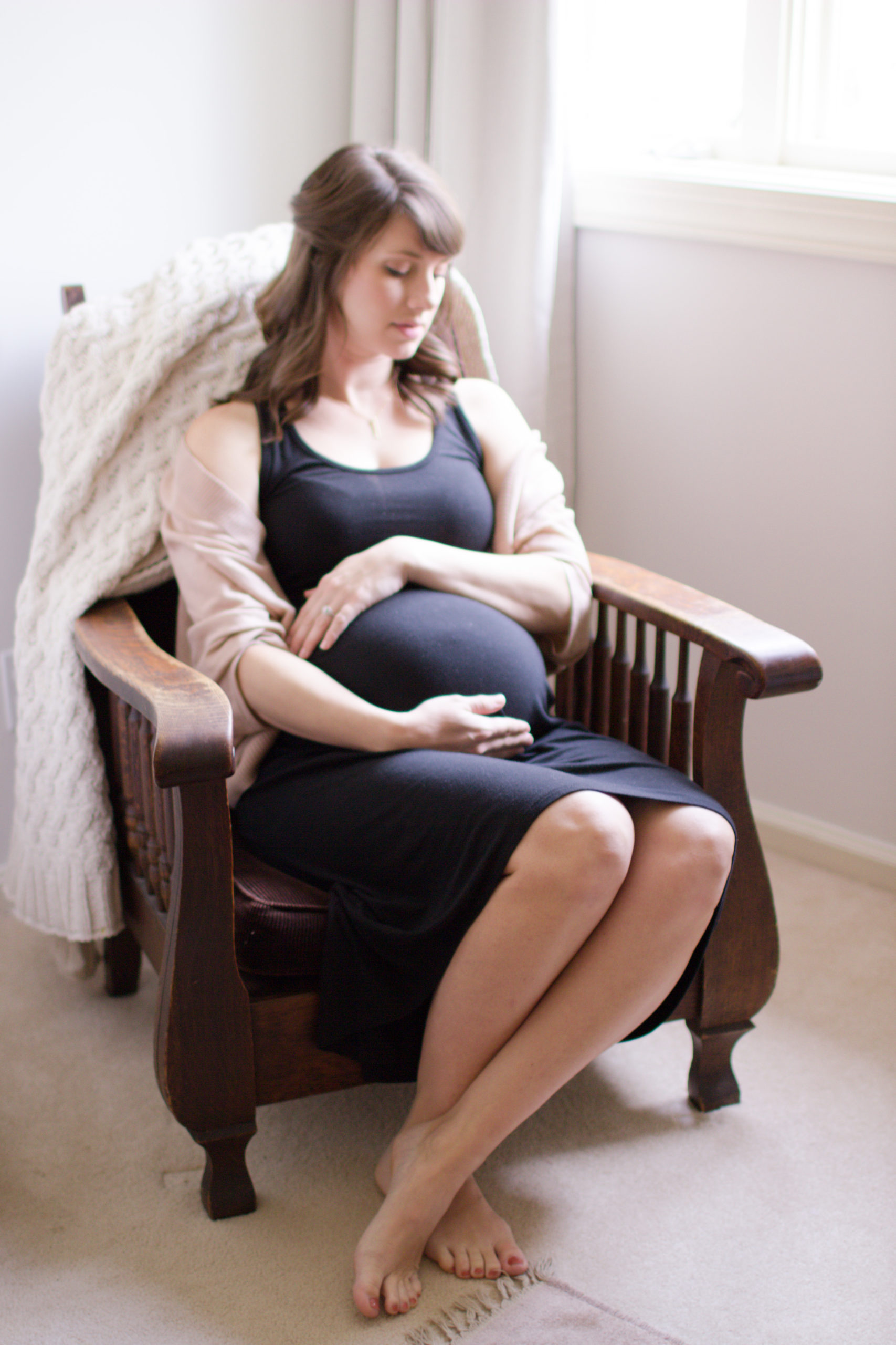 Light and Airy Natural Maternity Photo Session Expectant Mother Lifestyle Sitting in Chair